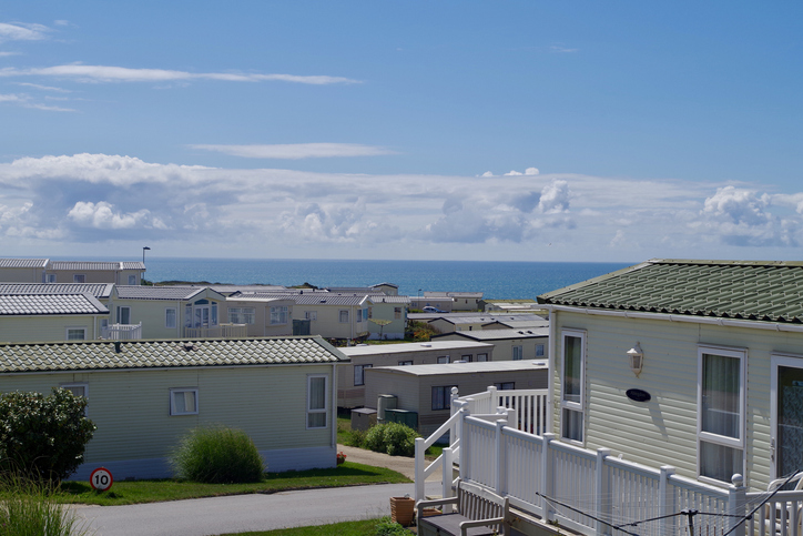 View of the English Channel on a sunny summers day from Sunnyside Caravan park in Peacehaven, England, UK.