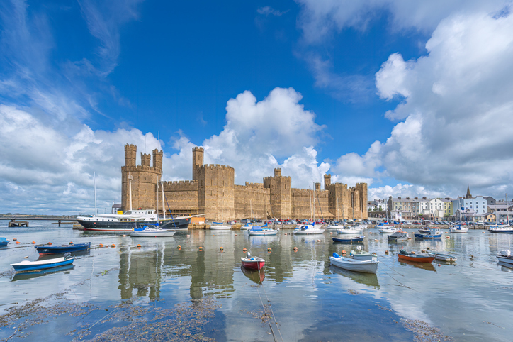 Caernarfon,Wales on 17th July 2023: Caernarfon Castle is situated on the River Seiont overlooking the Menai Straits in North wales