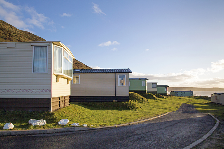 Static caravan holiday homes at Llangennith on the Gower Peninsular in out of season winter. The caravans are closed up until spring.