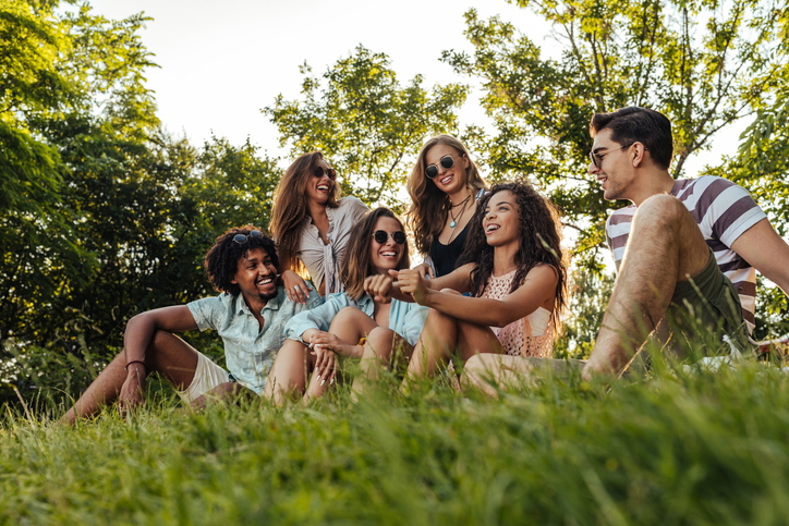 Group of friends having fun while out at the park