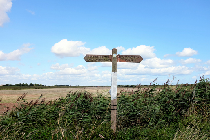 Coastal farmland and countryside with a big sky at Anderby Creek in Lincolnshire | Anderby Creek, Lincolnshire, UK. August 18, 2017. Coastal farmland and countryside with a big sky at Anderby Creek in Lincolnshire.