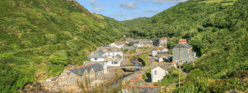 The small village of Boscastle, Cornwall in the middle of a lush green valley.