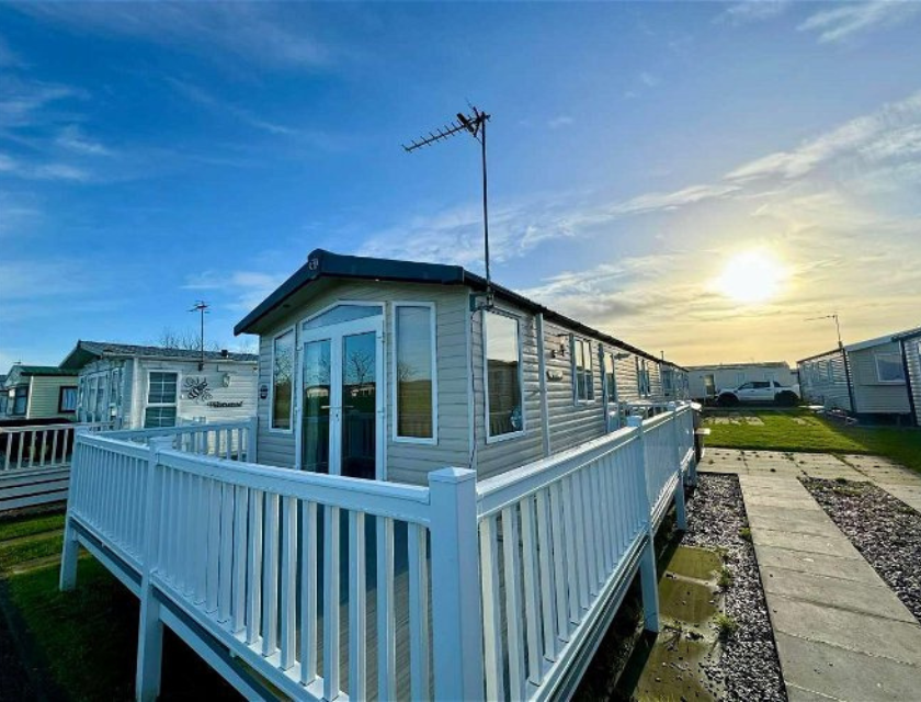 Exterior shot of a static caravan in Lyons Robin Hood Holiday Park near Prestatyn, Wales