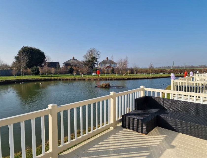 View from the decking of a static caravan in Golden Palm Holiday Park near Lincolnshire. 