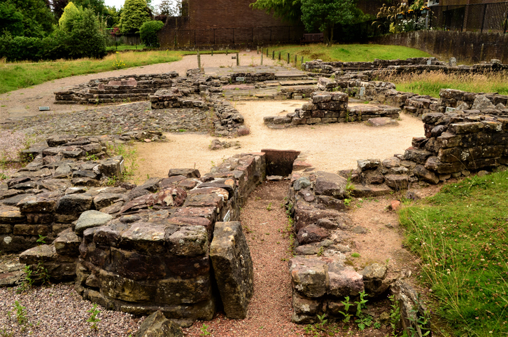 A view of the ruins of an ancient Roman baths complex.