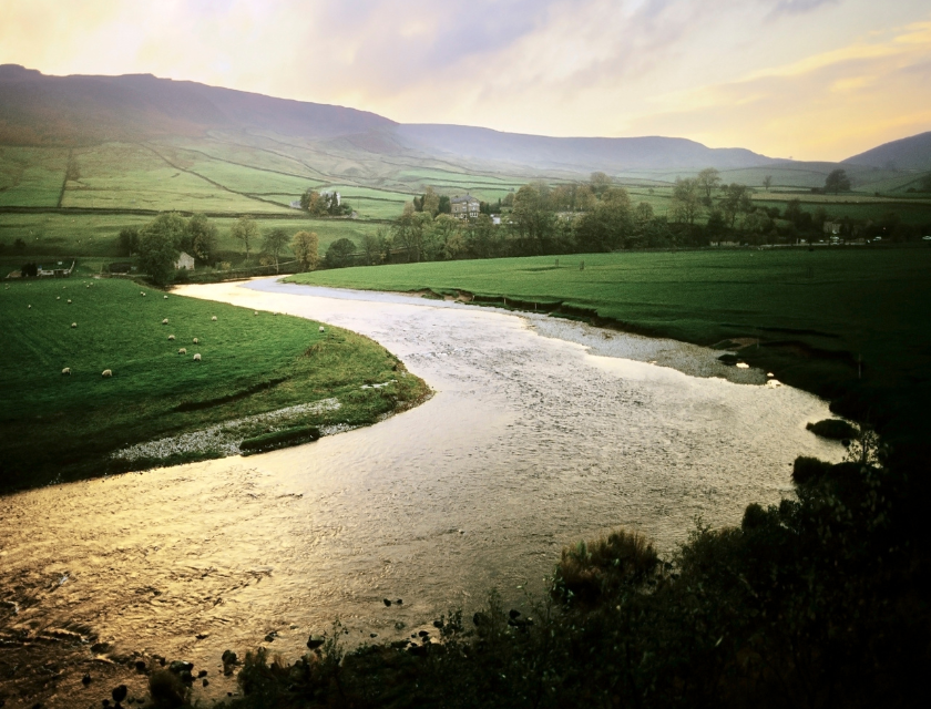 Winding river in a countryside setting. Perfect for a festive countryside walk during your UK Christmas Caravan Holiday.