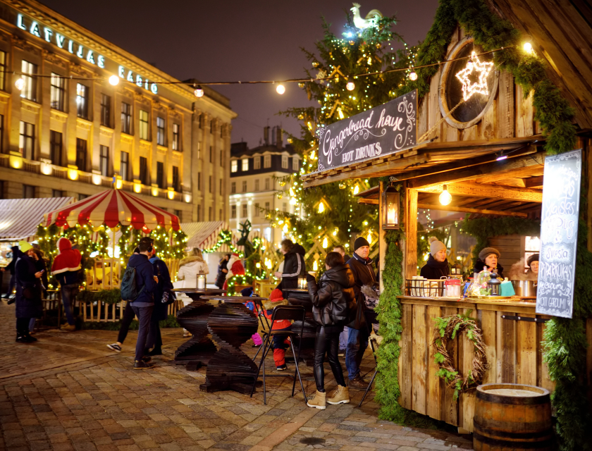 Gingerbread stall with hot drinks at a Christmas market.